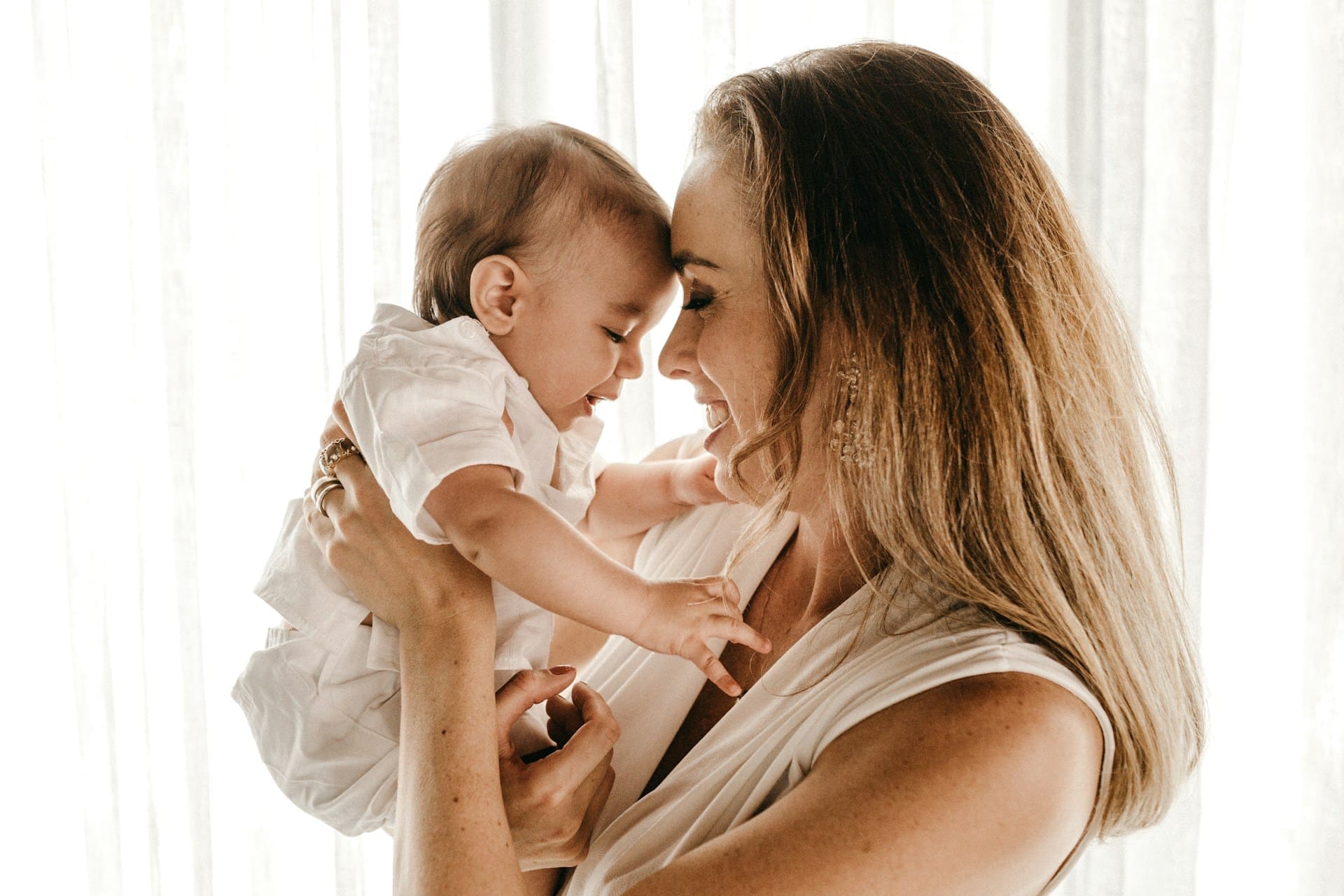 mother and child in a well lit room